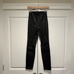 THEORY black leather skinny pants with side zip and ankle zips, size 0